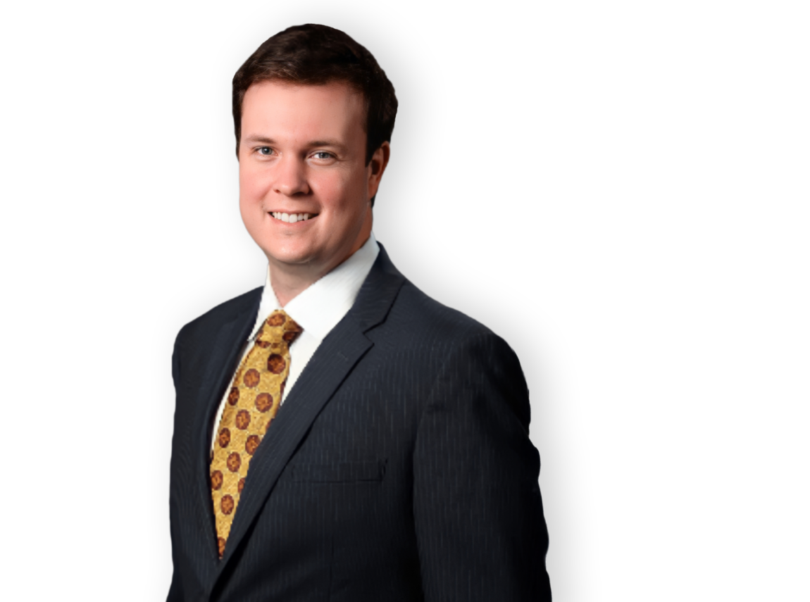 Smiling man in a suit with a patterned tie on a black background.